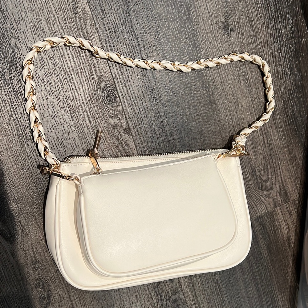 2 white/ ivory bags